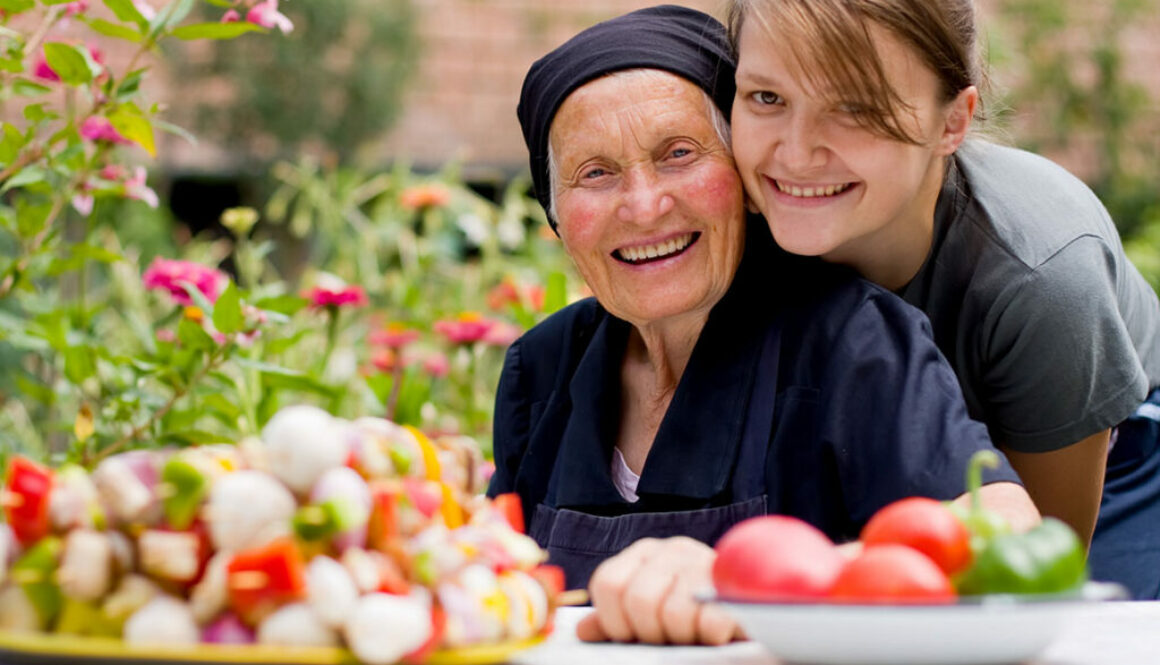 smiling elderly woman and daughter local home health care agency