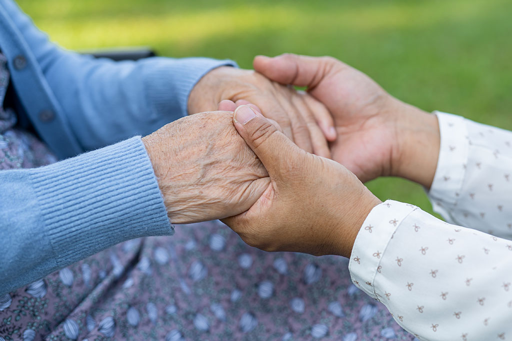 Elderly Hands Showing What Are the Stages of Death