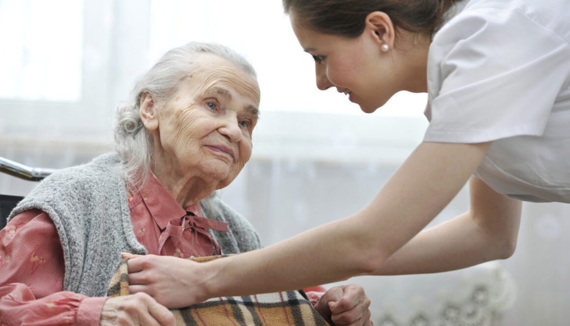 helpful caregiver explaining to patient how long It Takes to Admit her to Hospice