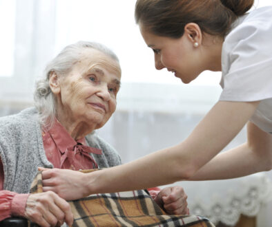 helpful caregiver explaining to patient how long It Takes to Admit her to Hospice